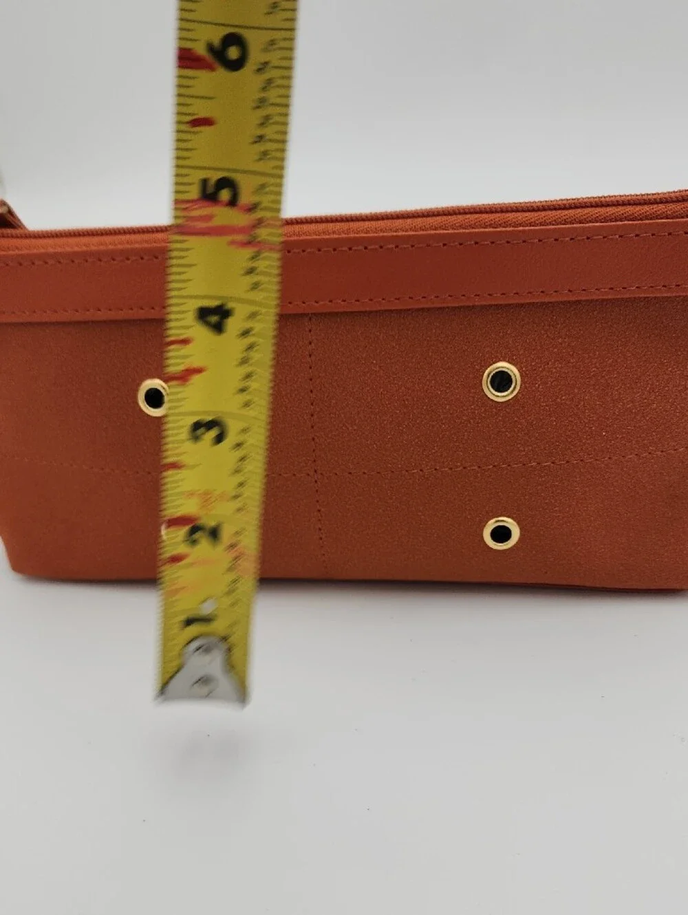 Estee Lauder Sleek Burnt Orange Zip Pouch with Gold Grommets